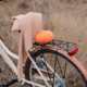 a fall seasonal photo of a bike and pumpkin